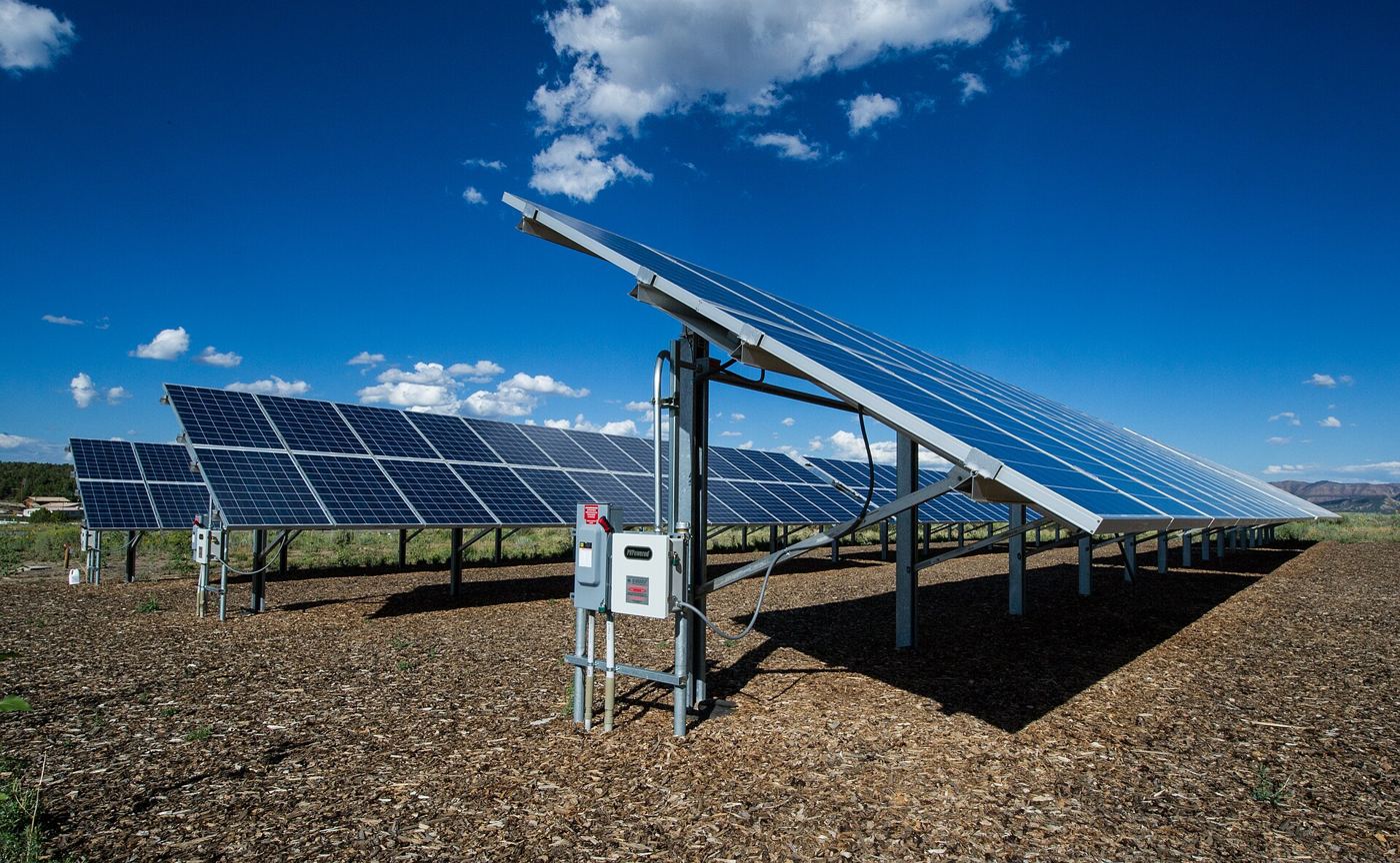 Solar panels in a bright desert landscape