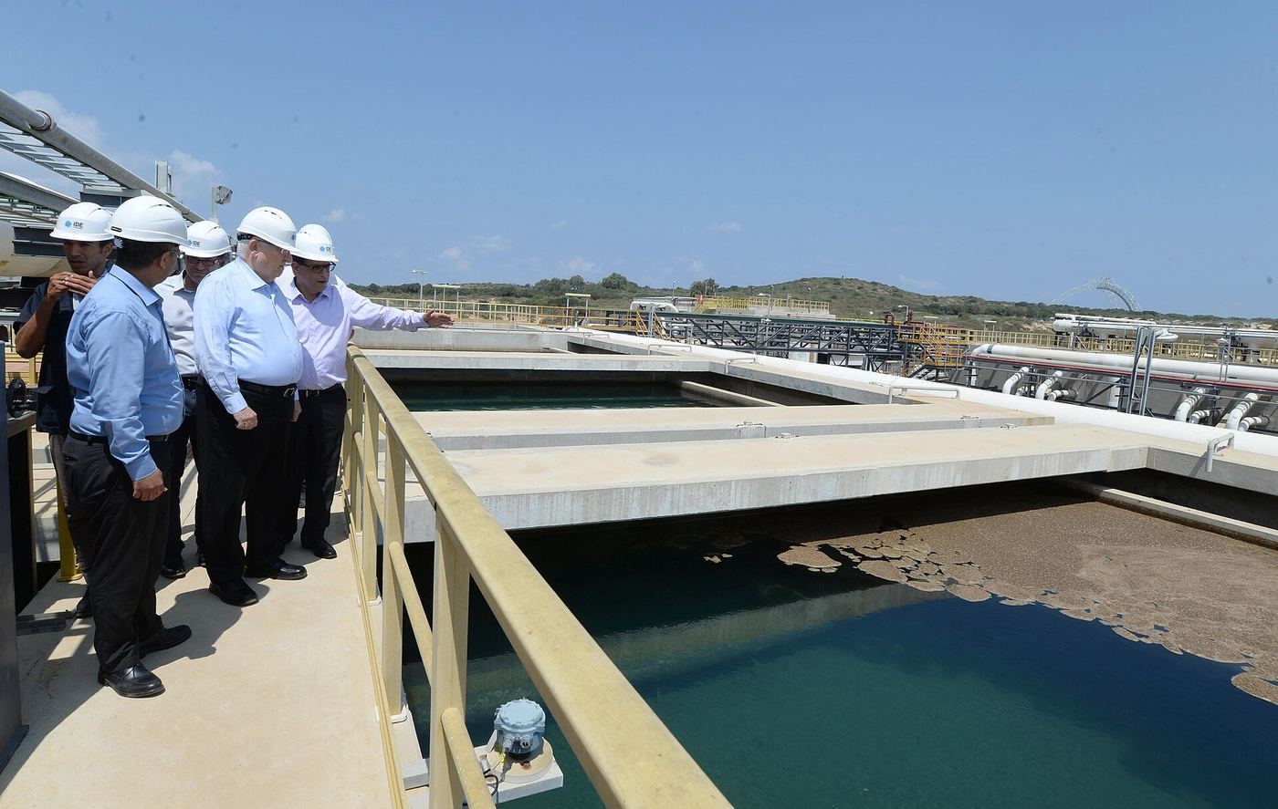A coastal desalination plant with large water pipes